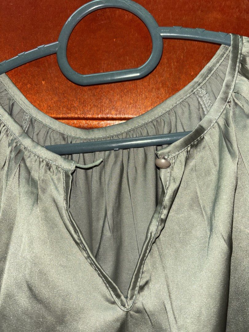 Blouse (Category: Blouses) located in Sungai Petani. Submitted by lianaessoo (Listing ID 1463982003, Image 3). Description: • Large cutting, XXL even can fit! • Material: Satin (thin) • Small defects at button (refer photo 3).