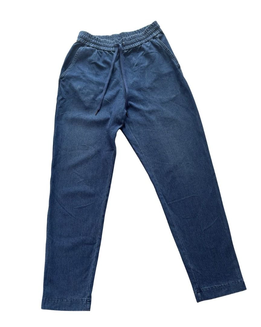 Blue Denim Jogger Pants with Drawstring Waist (Category: Jeans) located in Tanauan. Submitted by arlene_panganiban (Listing ID 1463999316, Image 1). Description: - Casual blue denim pants - Comfortable elastic waistband with drawstring - Two side pockets - Classic straight leg cut - Ideal for everyday wear - Versatile styling with t-shirts or sweaters.