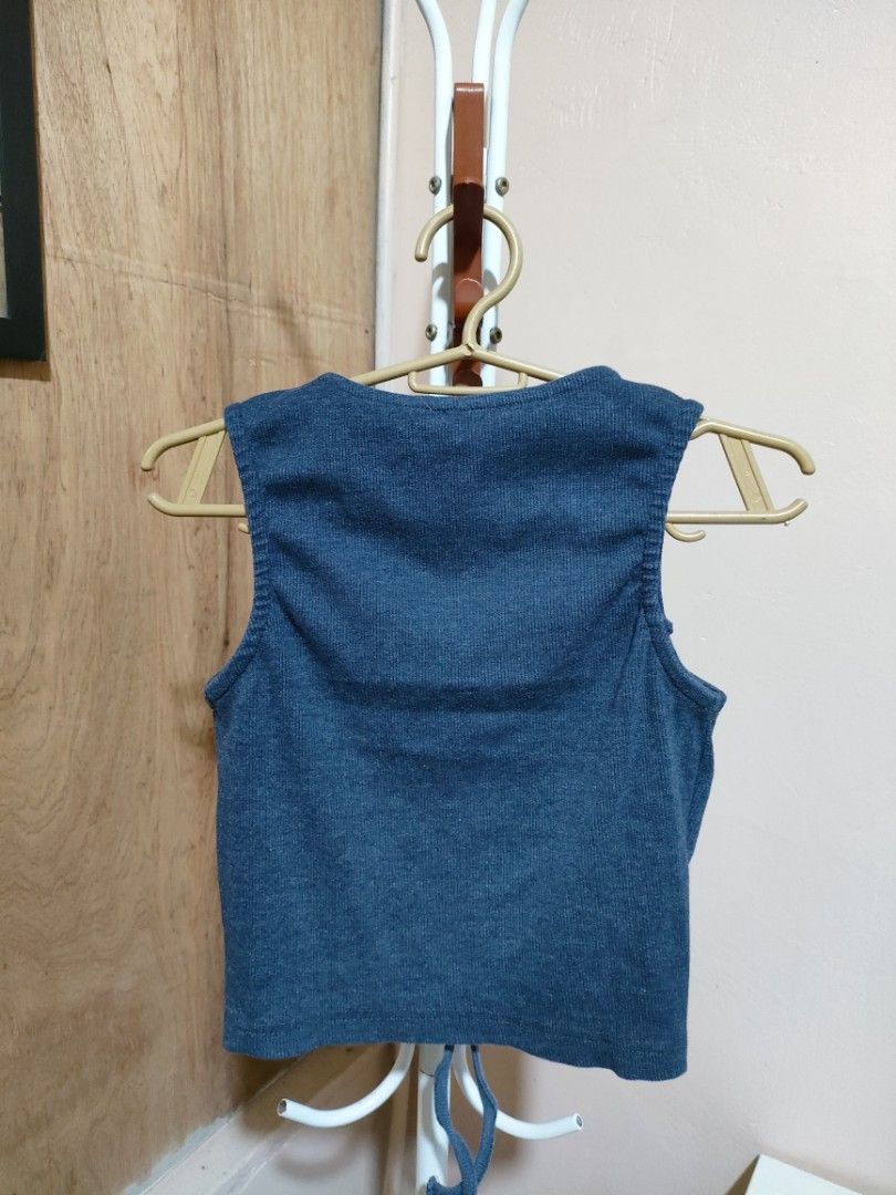Blue Ribbed Ruched V-Neck Crop Tank Top (Category: Sleeveless) located in Quezon City. Submitted by syayayay (Listing ID 1464064525, Image 2). Description: - Blue ribbed tank top - Flattering V-neck with adjustable drawstring detail - Sleeveless design - Trendy cropped length.