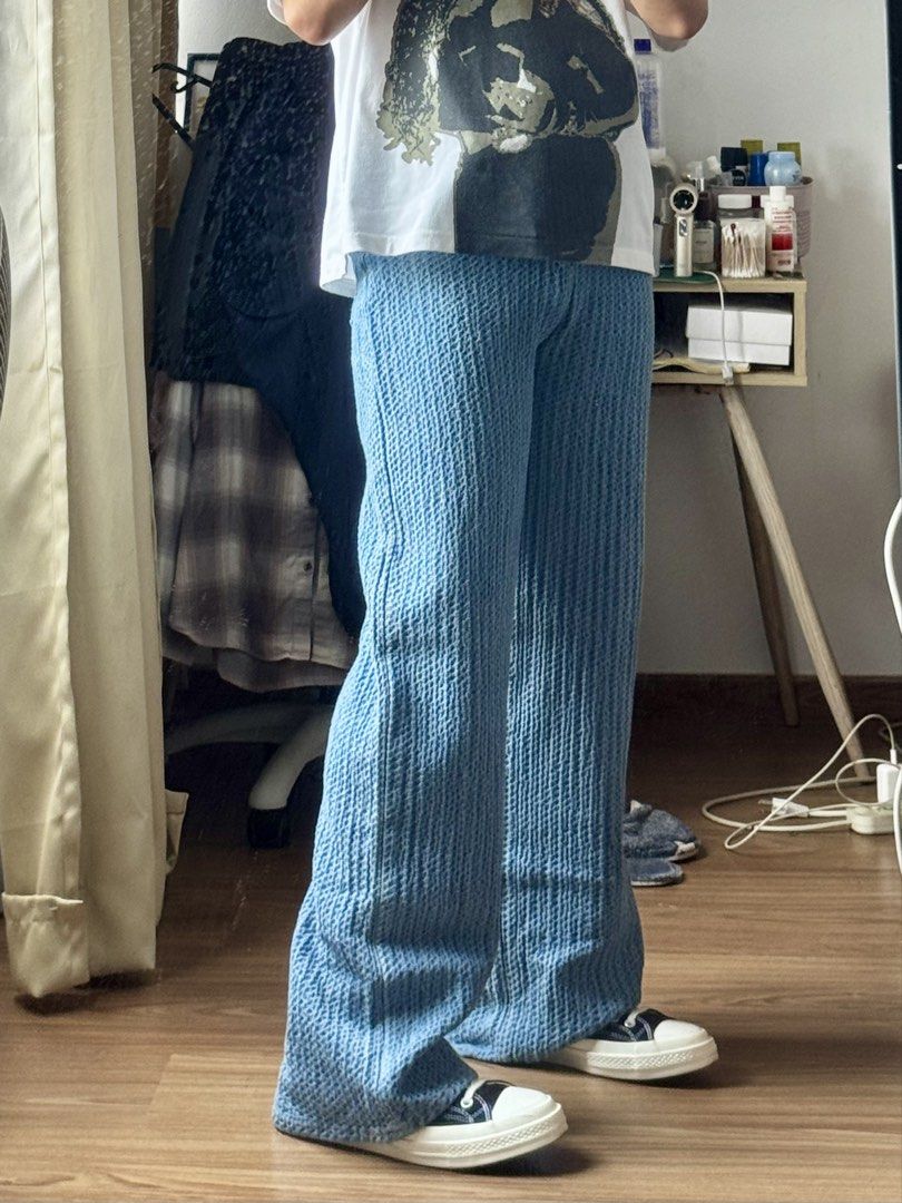 Blue Textured Denim Wide Leg Jeans (Category: Jeans) located in Makati City. Submitted by yellowjacketangel (Listing ID 1463973118, Image 3). Description: Light blue jeans with a textured vertical stripe pattern. High-waisted with a wide leg fit. Great for pairing with sneakers or sandals. Waist size: 28-29 📍Makati Sf via: Lala/Grab/J&T.