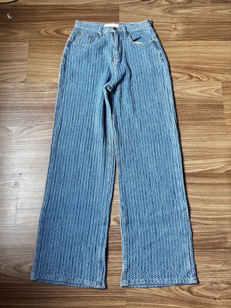 Blue Textured Denim Wide Leg Jeans (Category: Jeans) located in Makati City. Submitted by yellowjacketangel (Listing ID 1463973118, Image 1). Description: Light blue jeans with a textured vertical stripe pattern. High-waisted with a wide leg fit. Great for pairing with sneakers or sandals. Waist size: 28-29 📍Makati Sf via: Lala/Grab/J&T.