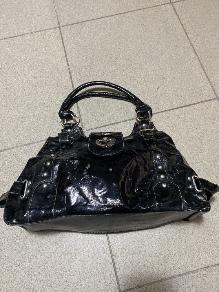 Boardwalk Black Bag (Category: Shoulder Bags) located in Dagupan City. Submitted by maryennie (Listing ID 1464002951, Image 1). Description: Working zippers (all) Spacious interior Structured design Suitable for work, daily use or travel -Condition: Pre-loved, with visible signs of use such as surface scratches/scuffs and some wear on the silver hardware. Please refer to photos for exact condition. ⭐️Selling as-is. Please inspect photos carefully