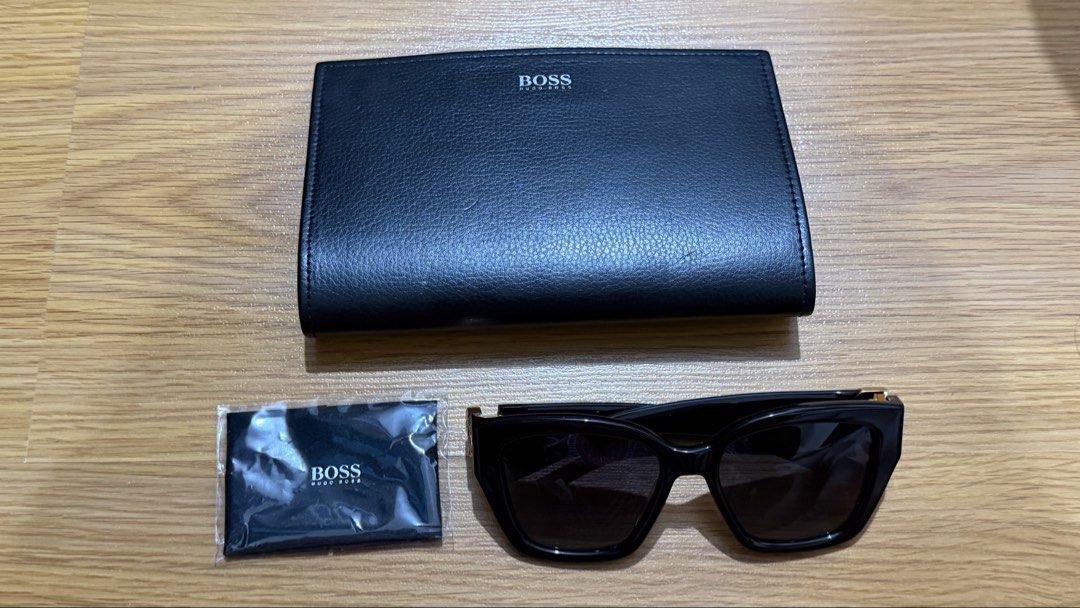 BOSS 1938/G/S 807 Sunglasses (Category: Sunglasses & Eyewear) located in Manila. Submitted by bambamkimchi (Listing ID 1463972964, Image 3). Description: - Authentic BOSS sunglasses - Sleek black frame with signature gold BOSS logo detail on the sides - Comes with BOSS protective case - Includes BOSS cleaning cloth - from Sunglass Haven.