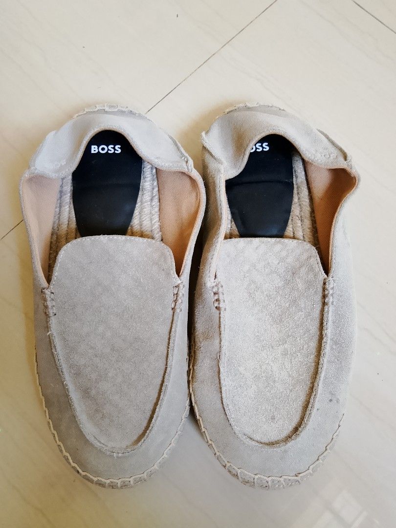 BOSS Suede Espadrilles Slip-on Shoes (Category: Casual Shoes) located in Manila. Submitted by arjaygoodfind (Listing ID 1463973416, Image 1). Description: - Brand: BOSS - Style: Espadrilles - Color: Light Beige - Material: Suede upper, Leather/Textile lining - Size: 40 - Origin: Made in Vietnam - Features: Comfortable slip-on, BOSS logo embossed on sole.