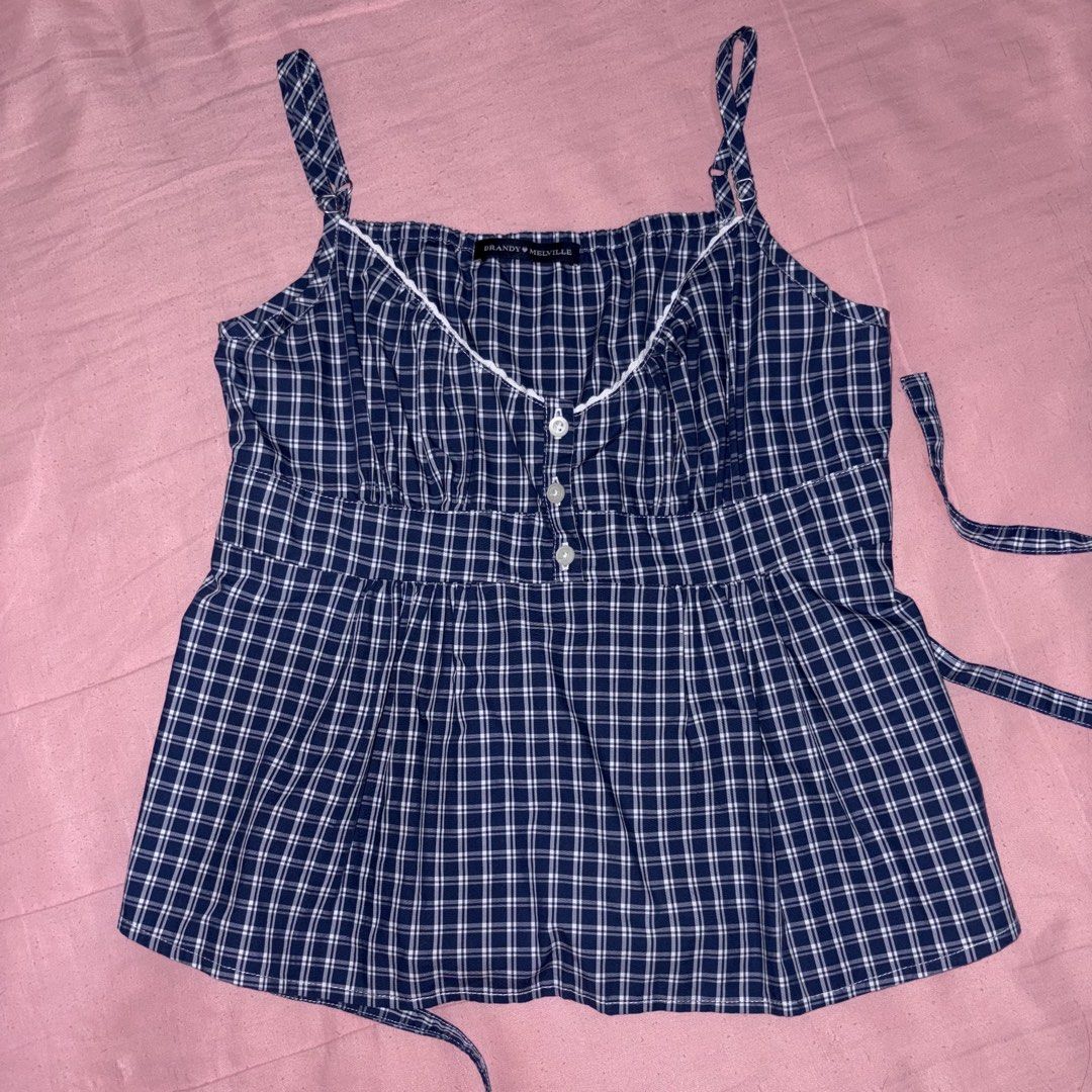 Brandy Melville Blue Plaid Tiffany Top (Category: Sleeveless) located in Cavite. Submitted by yema.cake (Listing ID 1464046451, Image 1). Description: CAN SWAP WITH THE TIFFANY TOP IN A DIFFERENT COLORWAY (see last photo) RFS: decluttering MOP: gcash MOD: j&t strictly no returns/refund policy 🏷️ - motel rocks - uniqlo - hollister - princess polly - bershka - stradivarius - zara - cotton on - h&m / hnm - gingham.