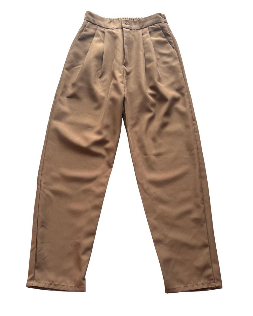 Brown Pleated High-Waisted Pants (Category: Jeans) located in Tanauan. Submitted by arlene_panganiban (Listing ID 1463999698, Image 1). Description: - High-waisted brown pants - Front pleats for a flattering look - Fabric with a slight sheen - Relaxed fit through the legs - Cuffed hem - Effortlessly dress up or down - Easy to pair with various tops.