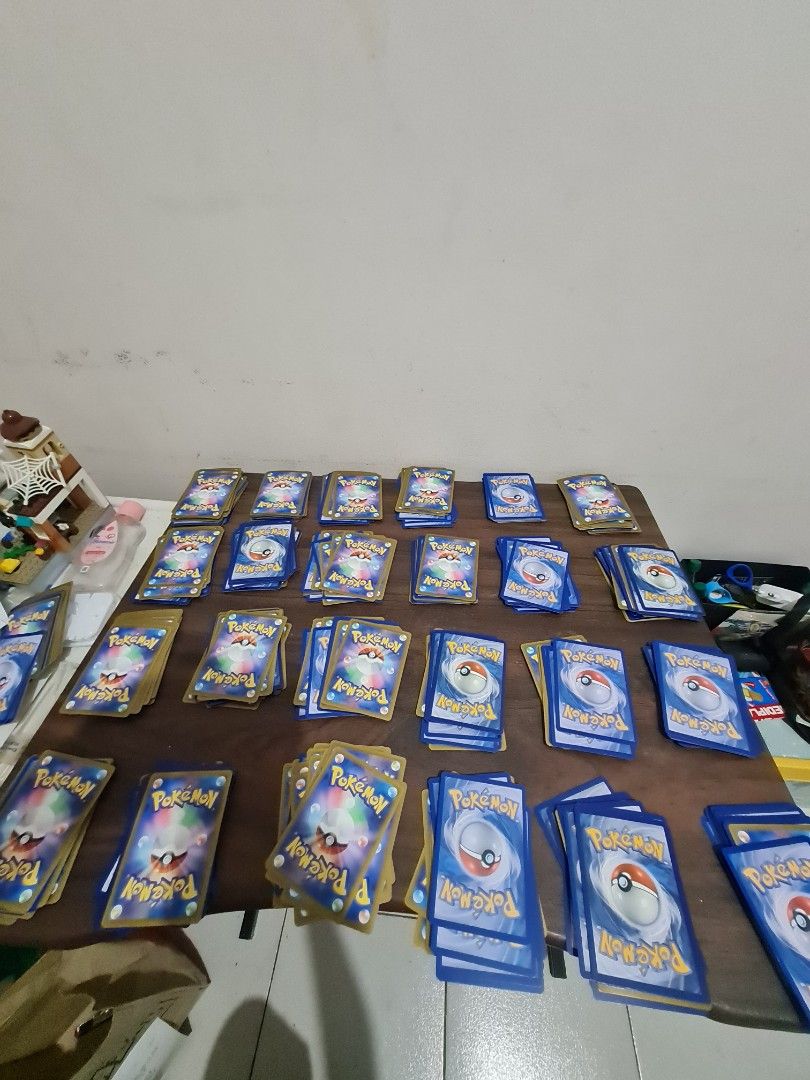 Bulk Pokemon Cards - Multiple Stacks Available (Category: Raw Singles) located in Quezon City. Submitted by declutter1990 (Listing ID 1449274116, Image 1). Description: 399 pesos for 300 pieces LOCATION NEAR MCDO KATIPUNAN MIX CARDS HINDI PO PWEDE PUMILI. SAME GOES IF U BUY IT FROM STORES HINDI MAKIKITA DONT ASK FOR PHOTOS OR VIDEOS OF FRONT PART OF CARDS MIX OF BLUE AND YELLOW ENGLISH AND NON ENGLISH WILL IGNORE ASKING FOR PICTURES OF FRONT ART 