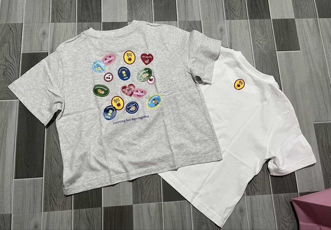 BUNDLE Uniqlo Hello Kitty shirts (Category: Coats, Jackets and Outerwear) located in Bacoor. Submitted by cherc. (Listing ID 1464134826, Image 2). Description: Take all for 1500 All are bought from store, retails at 790 each Light and dark gray are unused Fits med to large.