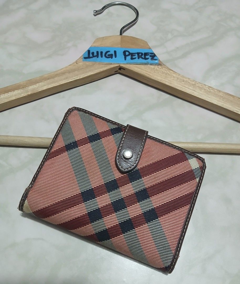 Burberry Blue Label Plaid Wallet (Category: Luxury Bags & Wallets) located in Plaridel. Submitted by igieperez147282 (Listing ID 1464005443, Image 3). Description: - Burberry Blue Label wallet - Classic pink and brown plaid pattern - Genuine leather trim - Secure snap closure - Ample interior card slots and compartments - Stylish and practical for daily use.