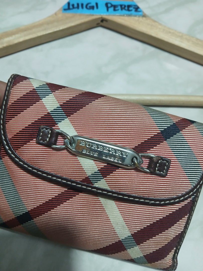 Burberry Blue Label Plaid Wallet (Category: Luxury Bags & Wallets) located in Plaridel. Submitted by igieperez147282 (Listing ID 1464005443, Image 2). Description: - Burberry Blue Label wallet - Classic pink and brown plaid pattern - Genuine leather trim - Secure snap closure - Ample interior card slots and compartments - Stylish and practical for daily use.