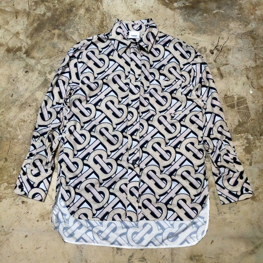 Burberry Monogram Print blouse (Category: Longsleeves) located in Zamboanga. Submitted by _oliverbmth (Listing ID 1464074859, Image 1). Description: - Iconic Burberry monogram print - Long sleeves - Button-up style - Material: 100% Polyester - Size: 36 - Made in China - Perfect for a statement look - Dimes 20x27.