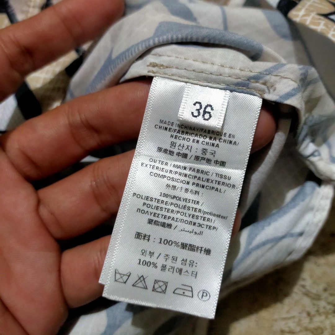 Burberry Monogram Print blouse (Category: Longsleeves) located in Zamboanga. Submitted by _oliverbmth (Listing ID 1464074859, Image 3). Description: - Iconic Burberry monogram print - Long sleeves - Button-up style - Material: 100% Polyester - Size: 36 - Made in China - Perfect for a statement look - Dimes 20x27.