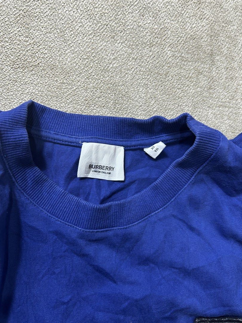 Burberry Shirt (Category: Activewear) located in Aurora. Submitted by purethrift07 (Listing ID 1464013372, Image 2). Description: Xl Fresh from the bale Dm me.