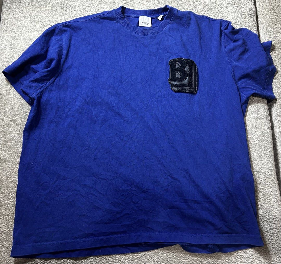 Burberry Shirt (Category: Activewear) located in Aurora. Submitted by purethrift07 (Listing ID 1464013372, Image 1). Description: Xl Fresh from the bale Dm me.