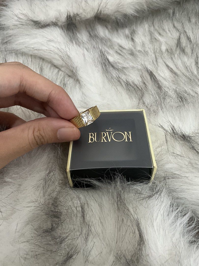 BURVON Clash Collection Ring in Zoi (Category: Rings) located in Manila. Submitted by francine.edit (Listing ID 1464010836, Image 1). Description: Description: Selling my brand new Burvon Zoi Ring from The Classic Collection. Completely unused and still comes with its original box! Brand / Collection: Burvon - The Classic Collection Model / Style: Zoi Ring (Gold ribbed band with emerald-cut clear stone) Size: 7 Condition: Brand New / Unused (Incl