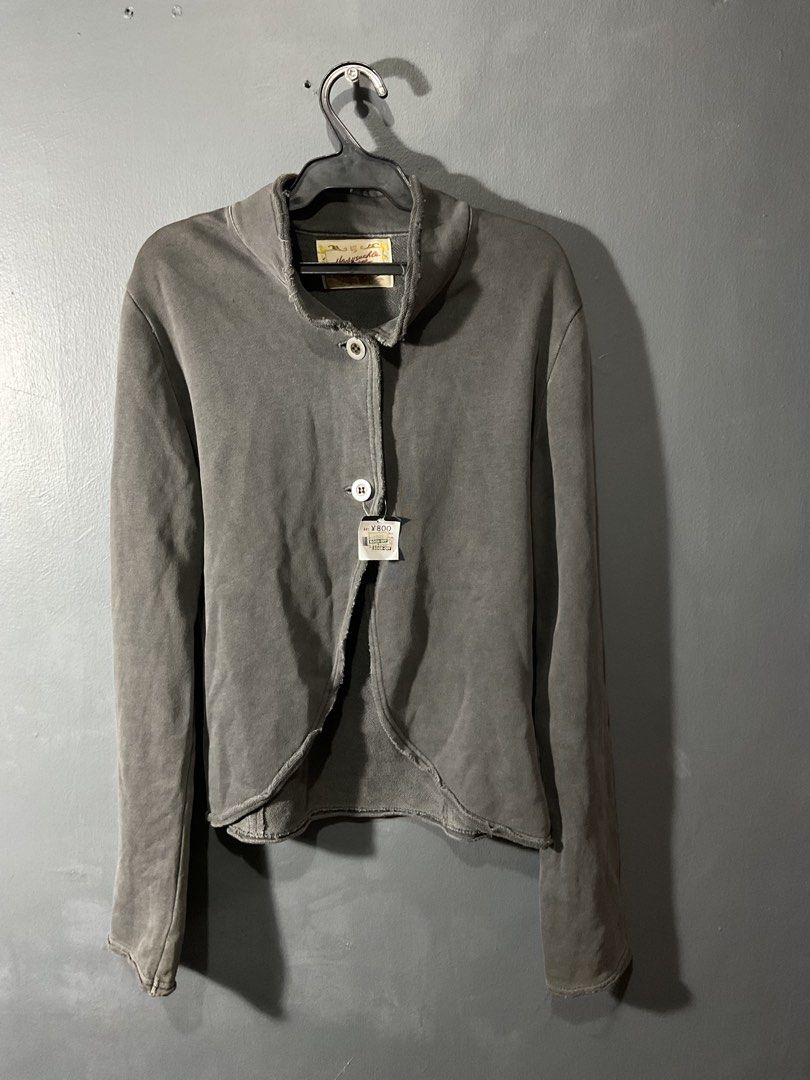 Button-Up Jacket (Category: Coats, Jackets and Outerwear) located in Manila. Submitted by noblewater-1a3b (Listing ID 1464022735, Image 1). Description: - Grey jacket from Honeysuckle Rose - Size: Medium (M) - Unique raw hemline and collar - Two-button front closure - Washed/distressed appearance - Ideal for layering.