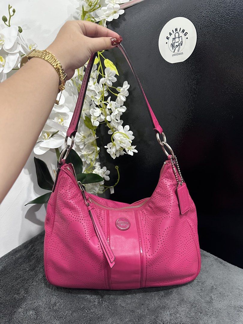 cöachh perforated pink hobo (Category: Looking For) located in Rizal. Submitted by raining_bags (Listing ID 1464068949, Image 1). Description: excellent condition authentic 💯.