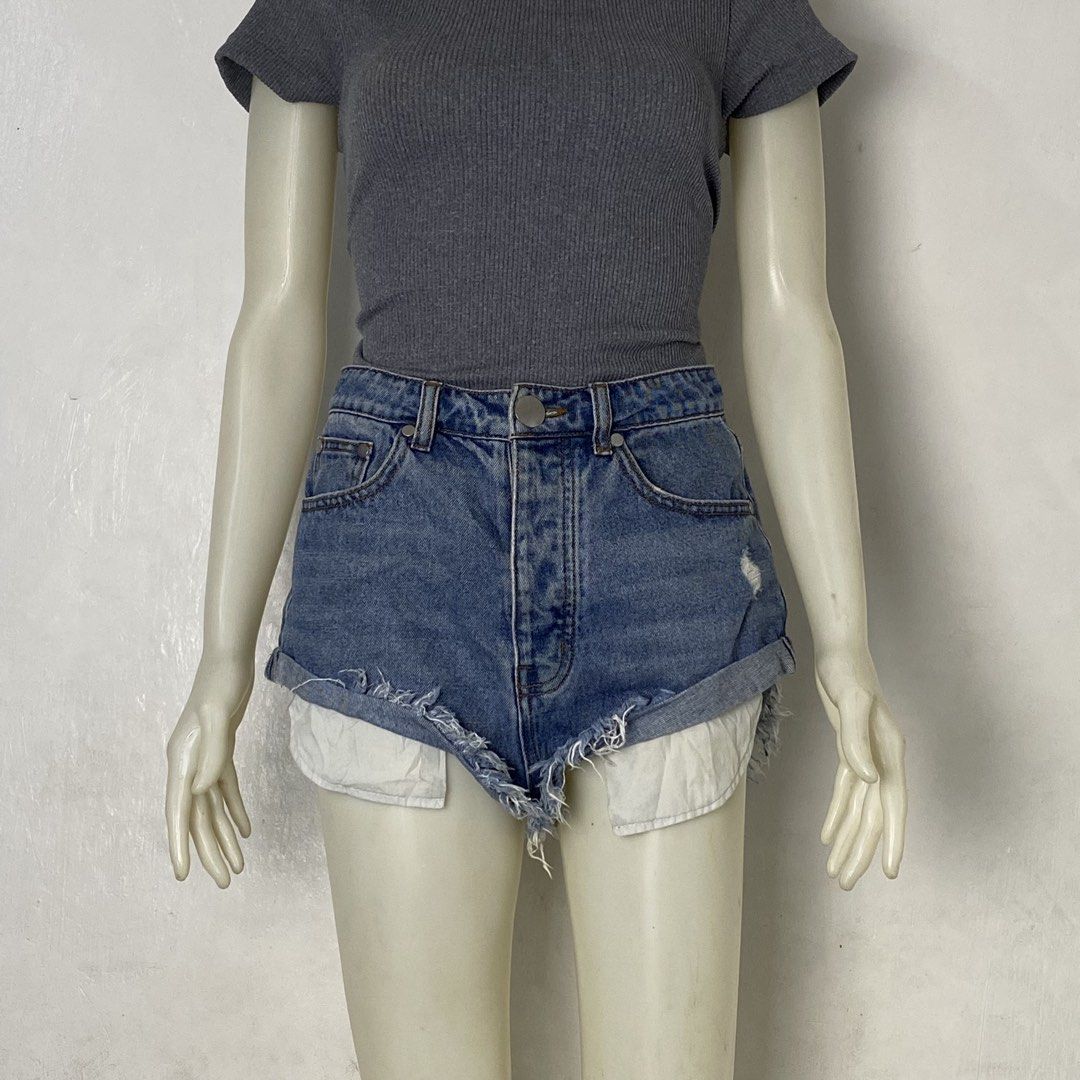 CAFFEINE 🌸 | Blue Distressed Cut-Off Shorts (Category: Shorts) located in Bulacan. Submitted by orc.ph (Listing ID 1464034189, Image 2). Description: CAFFEINE 🌸 | Blue Distressed Cut-Off Shorts Material Used: 100% Cotton -Blue - Casual -Streetwear -Short -High Rise -Multi-Pocket Layer -Hidden Button-Fly Closure -Curved Tulip-Cut Leg Opening ‎-Size: XS ‎-Waistline: 28” ‎-Length: 14” ‎Pristine Condition. No Visible Flaws ‎ ISSUE: NONE ‎ ‎⚠️Note: 