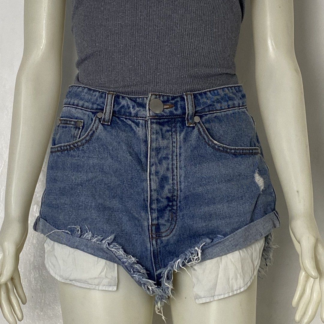 CAFFEINE 🌸 | Blue Distressed Cut-Off Shorts (Category: Shorts) located in Bulacan. Submitted by orc.ph (Listing ID 1464034189, Image 3). Description: CAFFEINE 🌸 | Blue Distressed Cut-Off Shorts Material Used: 100% Cotton -Blue - Casual -Streetwear -Short -High Rise -Multi-Pocket Layer -Hidden Button-Fly Closure -Curved Tulip-Cut Leg Opening ‎-Size: XS ‎-Waistline: 28” ‎-Length: 14” ‎Pristine Condition. No Visible Flaws ‎ ISSUE: NONE ‎ ‎⚠️Note: 