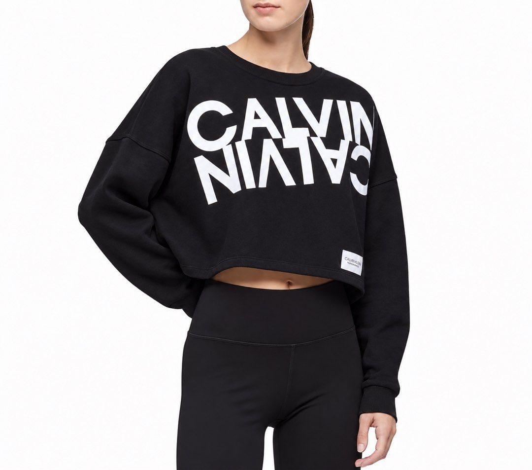 Calvin Klein Black Cropped Logo Sweatshirt (Category: Longsleeves) located in Pasig City. Submitted by shopsmart.mnl (Listing ID 1464112831, Image 1). Description: Brand new with tag XL in tag.