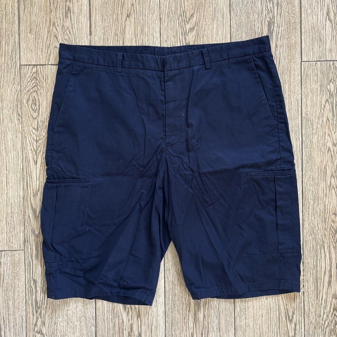 Calvin Klein Navy Blue Cargo Shorts (Category: Shorts) located in Imus. Submitted by reloved.nd (Listing ID 1464071696, Image 1). Description: - Navy blue Calvin Klein cargo shorts - Size 33 - Classic cargo style with side pockets - Comfortable fit for everyday wear - Perfect for casual outings.