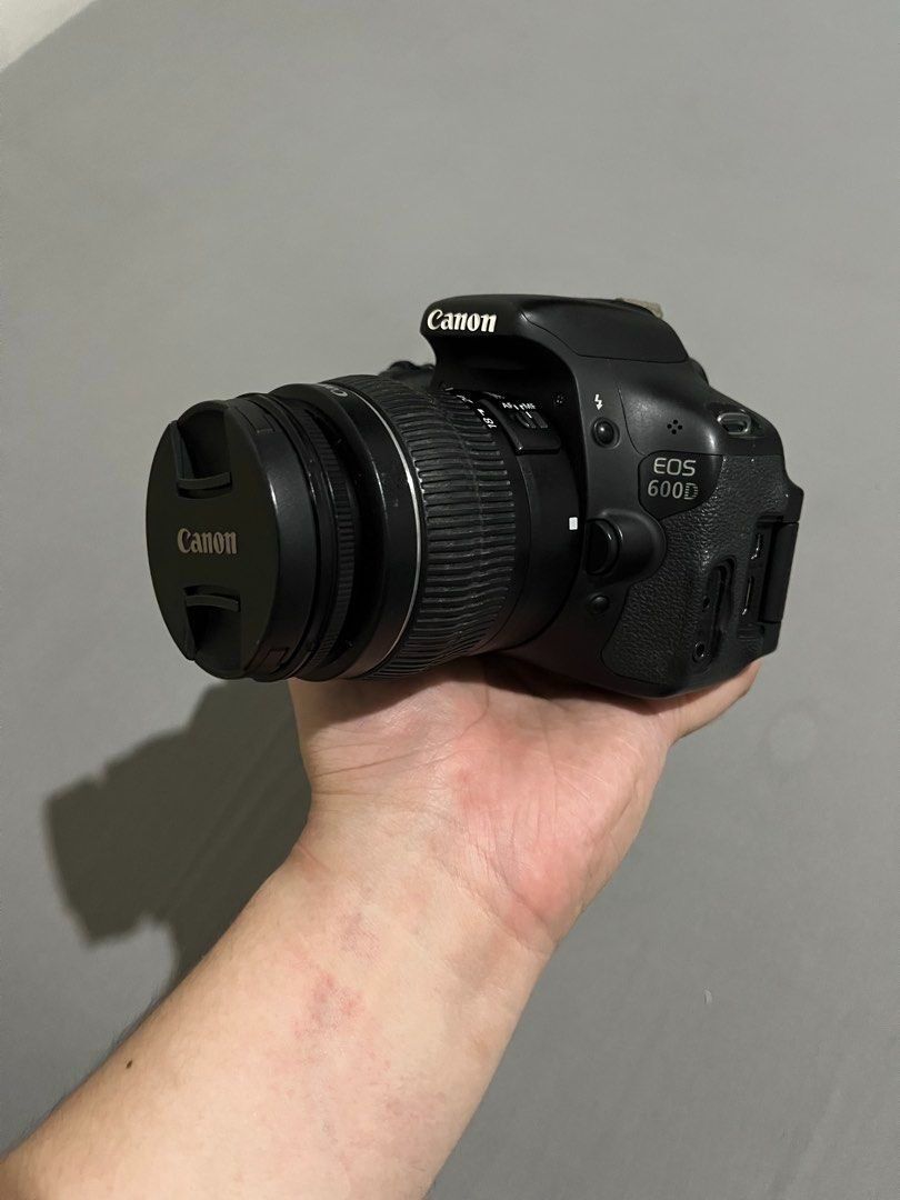 Canon EOS 600D - Body + Kit Lens (Category: Cameras) located in Paranaque City. Submitted by mavicoslop (Listing ID 1463953142, Image 2). Description: Canon EOS 600D Body +Kit lens 18-55mm Battery Charger Bag Defects: Lens fungus (have it cleaned or buy a new one) Rubber covers lost (seen in photos) Loose rubber lens zoom grip ring (seen in photos) Everything else is working. Can also do lalamove. Shipping covered by buyer.