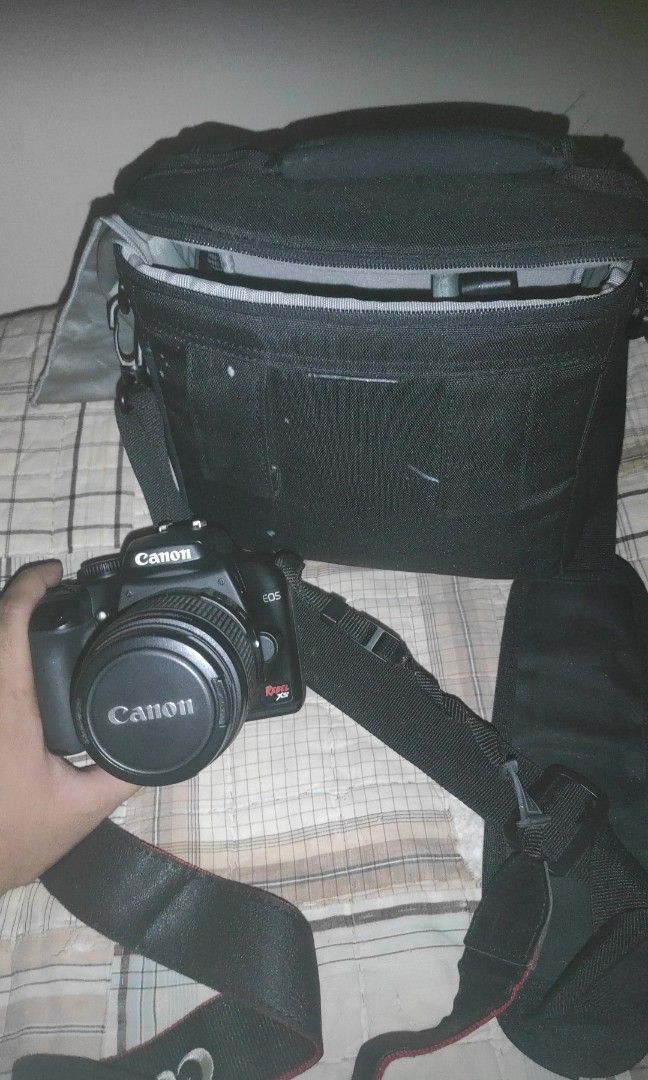 Canon Eos Rebel xs 1000D (Category: Cameras) located in Manila. Submitted by kikko.cloud (Listing ID 1463973089, Image 1). Description: *Canon EOS Rebel XS (1000D) DSLR + 18-55mm Kit Lens - Slightly Used - 8.5/10* *Price: ₱6,500 (Negotiable for sure buyer)* Perfect for beginners, photography students, and hobbyists! *Specifications:* - 10.1MP APS-C CMOS Sensor - Canon EF-S 18-55mm f/3.5-5.6 Kit Lens (Clean, No Fungus, No Haze) - DIGIC III Process