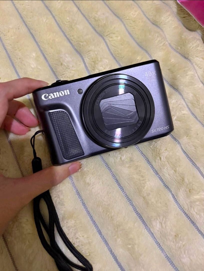 Canon SX720 HS 40x Optical Zoom Digital Camera (Category: Cameras) located in Caloocan City. Submitted by juaneossi (Listing ID 1464047331, Image 2). Description: - Canon PowerShot SX720 HS digital camera - Color: Grey - Incredible 40x optical zoom lens - Ideal for travel and everyday photography - User-friendly and portable design - Capture clear, detailed photos with ease.