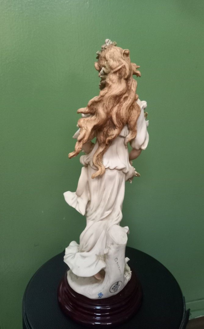 Capodimonte Lady with Flowers Figurine (Category: Figurines & Statues) located in Makati City. Submitted by rnst1 (Listing ID 1463958987, Image 3). Description: - Exquisite Capodimonte figurine of a lady holding flowers. - Features intricate details on her dress and hair. - Elegant base with a rich wood finish. - Adds a classic touch to any home decor. - Perfect for collectors or as a special gift. - Approximate height: [insert height here] inche