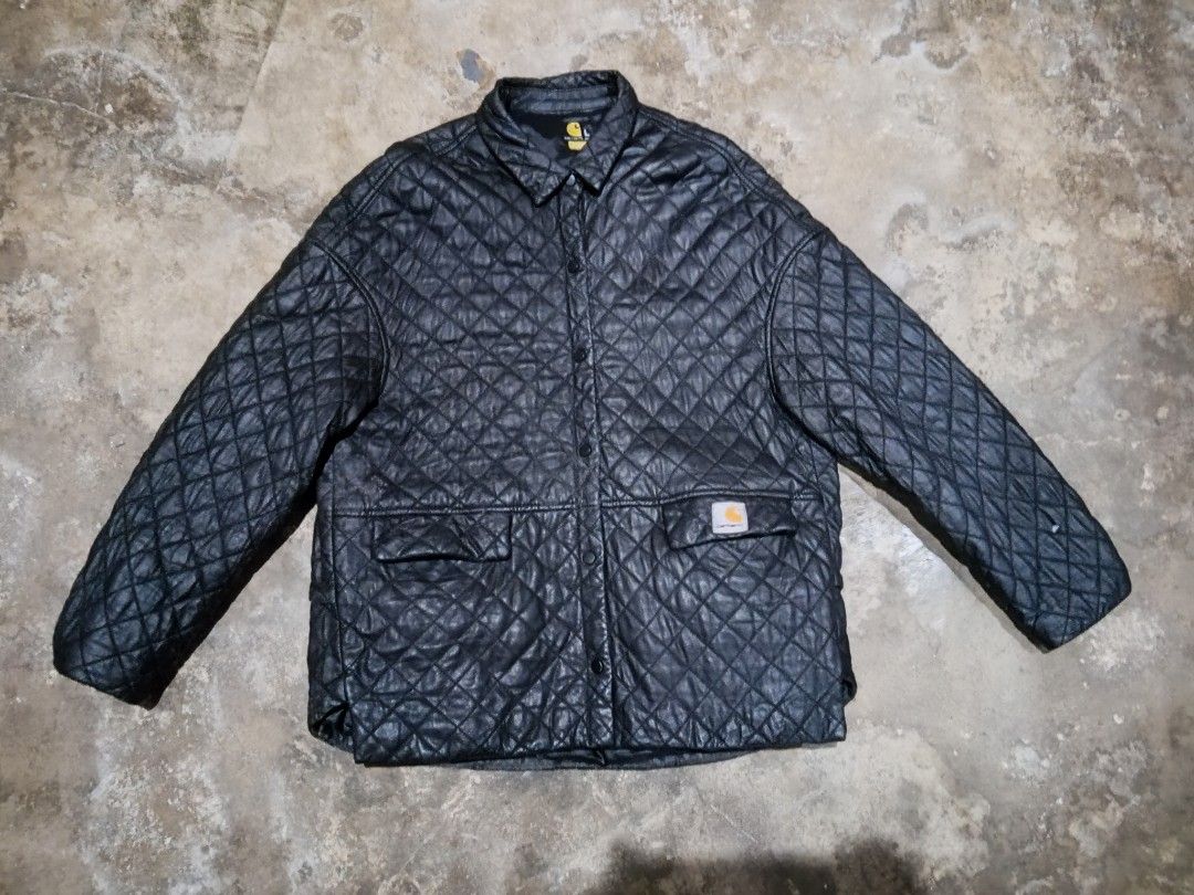 Carhartt Quilted Black Jacket L (Category: Coats, Jackets and Outerwear) located in Angeles City. Submitted by ramosjarie87785 (Listing ID 1464080834, Image 1). Description: - Brand: Carhartt - Type: Quilted Jacket - Color: Black - Size: L - Closure: Button-up - Pockets: Two front pockets - Lining: Smooth and shiny - Condition: Minor tear on the right sleeve (see last photo) - Style: Great for layering.