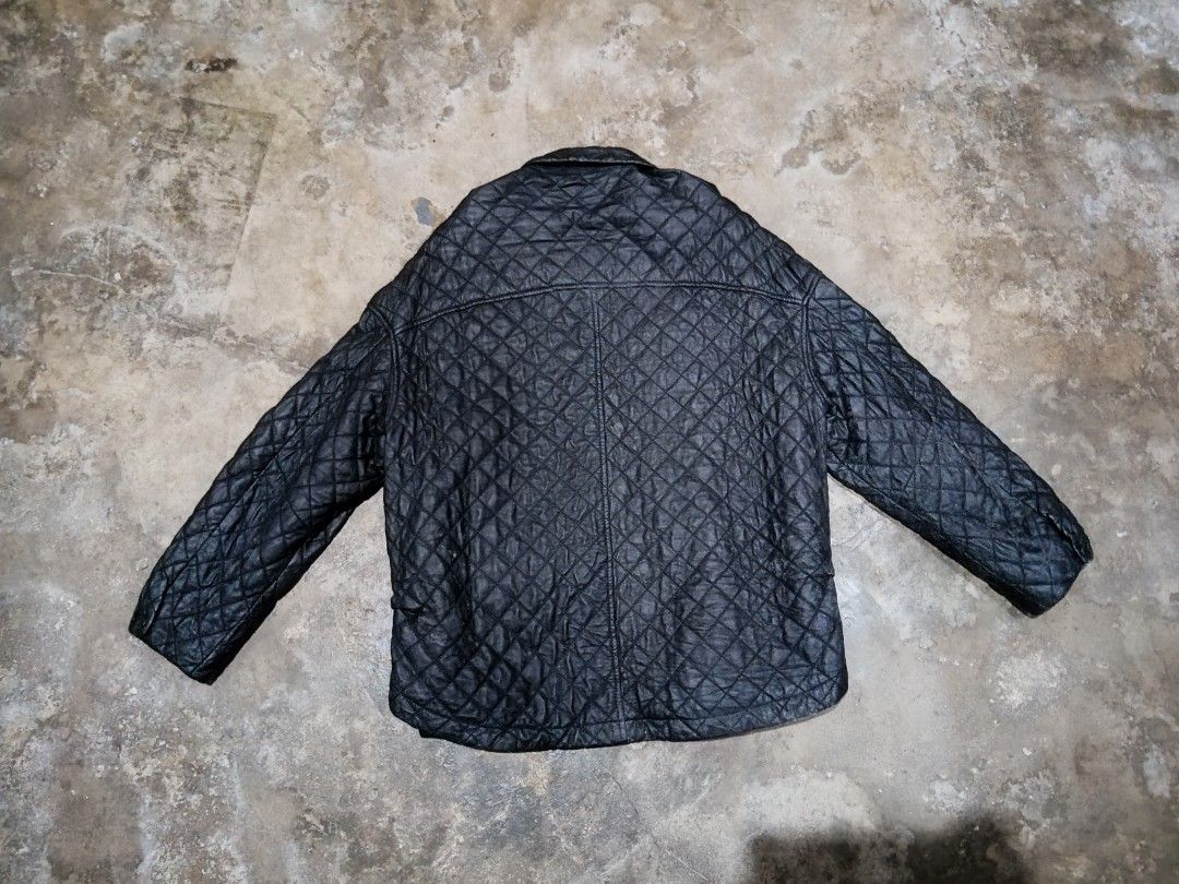Carhartt Quilted Black Jacket L (Category: Coats, Jackets and Outerwear) located in Angeles City. Submitted by ramosjarie87785 (Listing ID 1464080834, Image 2). Description: - Brand: Carhartt - Type: Quilted Jacket - Color: Black - Size: L - Closure: Button-up - Pockets: Two front pockets - Lining: Smooth and shiny - Condition: Minor tear on the right sleeve (see last photo) - Style: Great for layering.