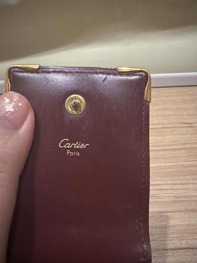 Cartier cigarette case (Category: Purses & Pouches) located in Quezon City. Submitted by theyellowbasket (Listing ID 1464100478, Image 2). Description: Authentic cartier cigarette case With serial code and heat stamp Issue: damage on edging see picture.