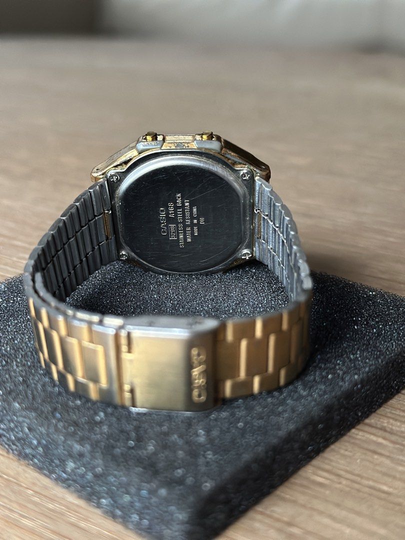 Casio A168W Digital Watch Gold Tone (Category: Women's Watches) located in Cainta. Submitted by the_lawww (Listing ID 1464000127, Image 2). Description: - Gold tone Casio digital watch - Features alarm, stopwatch (chrono), and illuminator light - Water resistant - Stainless steel back - Shows some signs of wear on gold plating and strap - Still a classic and functional timepiece ₱800 For meetups and delivery Antipolo, Taytay, Cainta, Pasig, Makat