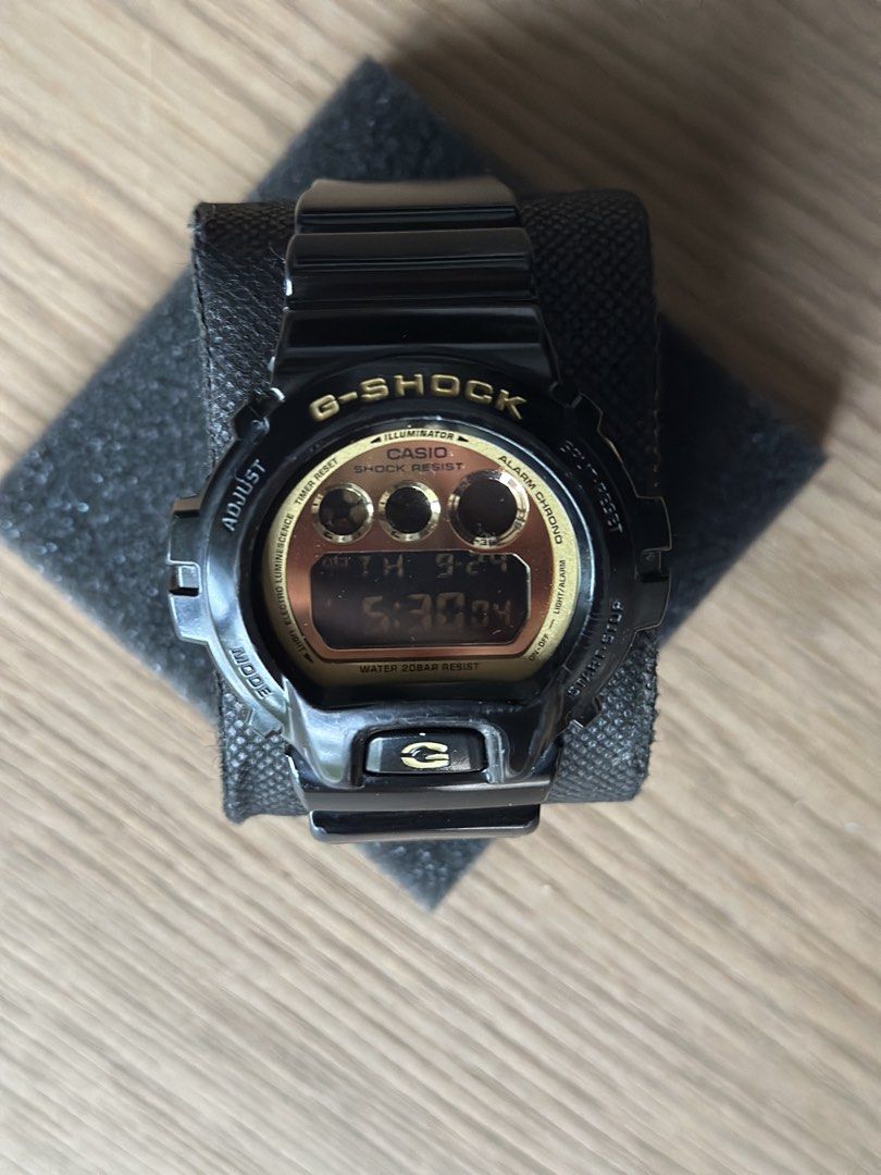 Casio G-Shock DW-6900CB Watch (Category: Men's Watches) located in Cainta. Submitted by the_lawww (Listing ID 1463993878, Image 1). Description: - Model: G-Shock DW-6900CB - Color: Black with Gold Face - Water Resistance: 200 Meters - Features: Shock Absorbing Structure - Ideal for: Everyday wear, sports, outdoor activities - Condition: Selling as is -Newly replaced battery ₱2,500 For meetups and delivery Antipolo, Taytay, Cainta, Pasig, Makati, 