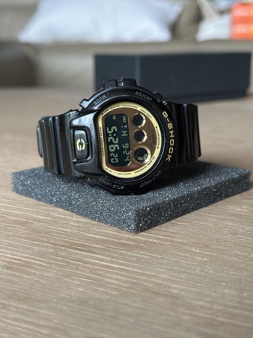 Casio G-Shock DW-6900CB Watch (Category: Men's Watches) located in Cainta. Submitted by the_lawww (Listing ID 1463993878, Image 3). Description: - Model: G-Shock DW-6900CB - Color: Black with Gold Face - Water Resistance: 200 Meters - Features: Shock Absorbing Structure - Ideal for: Everyday wear, sports, outdoor activities - Condition: Selling as is -Newly replaced battery ₱2,500 For meetups and delivery Antipolo, Taytay, Cainta, Pasig, Makati, 