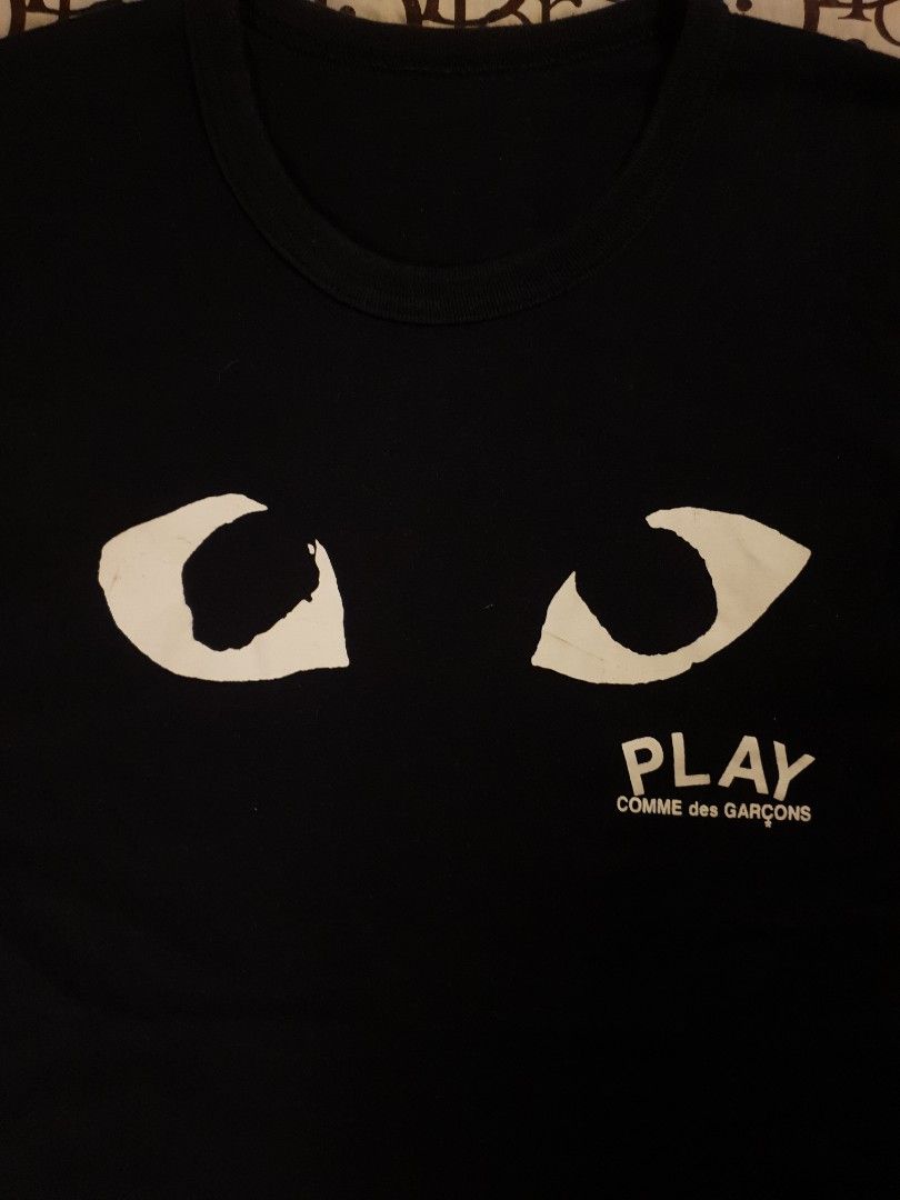 CDG PLAY eyes design (Category: Shirts) located in San Fernando. Submitted by retro.district. (Listing ID 1464122016, Image 2). Description: - Authentic CDG play eyes design - Size: Medium - Condition: Excellent - issue: cut necktag - Color Rate: 9.5/10.