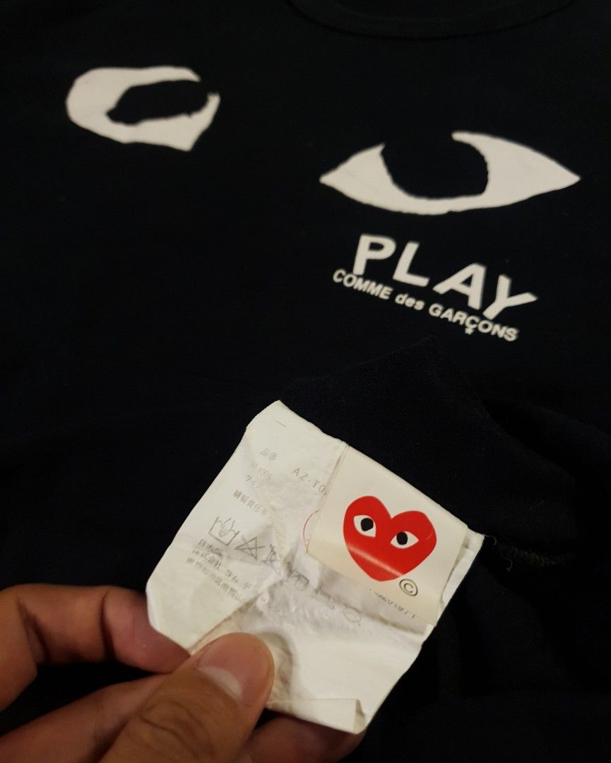CDG PLAY eyes design (Category: Shirts) located in San Fernando. Submitted by retro.district. (Listing ID 1464122016, Image 3). Description: - Authentic CDG play eyes design - Size: Medium - Condition: Excellent - issue: cut necktag - Color Rate: 9.5/10.