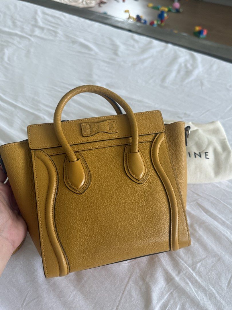 Celine Nano Luggage (Category: Luxury Bags & Wallets) located in Calamba. Submitted by mom2girls (Listing ID 1463993159, Image 2). Description: A head-turner color. Hard to let go since in really great condition pa, halos bago, but I have 4 yellow/mustard bags that I already rotate so I need to release one kasi na-hhighblood na asawa ko sa dami ng bags ko. Bakit daw kailangan ng different shades of yellow e pwede namang black lang for all. LOL! S
