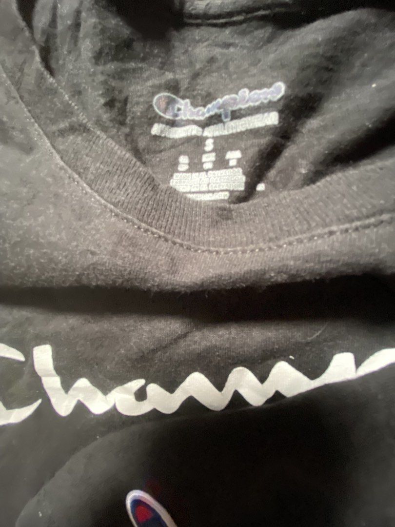 CHAMPION Big Script Tee Black S (Category: Tshirts & Polo Shirts ) located in Manila. Submitted by jayve_montecillo (Listing ID 1464106502, Image 2). Description: CHAMPION Script Logo Tshirt Dimes/W17xL26 • Brand: CHAMPION - Authentic Athleticwear • Size: S on tag • Color: Black with White Script Logo • Condition: 8.5/10 - Clean. No cracks sa print, embroidered sleeve logo goods pa • Details: 100% Cotton, Crew neck, Big center script “Champion” p
