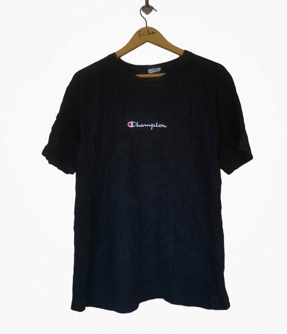 Champion Black T-shirt (Category: Tshirts & Polo Shirts ) located in Digos. Submitted by echooo123 (Listing ID 1464044355, Image 1). Description: CHAMPION Size: Large Good Condition Cr: 9/10 Presentable Solid over all .