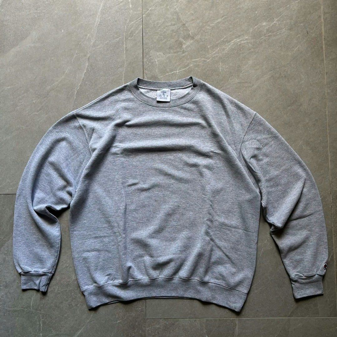 Champion Grey & Black Crewneck Sweatshirt (Category: Coats, Jackets and Outerwear) located in Manila. Submitted by lee_23 (Listing ID 1464023788, Image 1). Description: Dimes:XL 25x27 - Gray 25x 27 - Black.