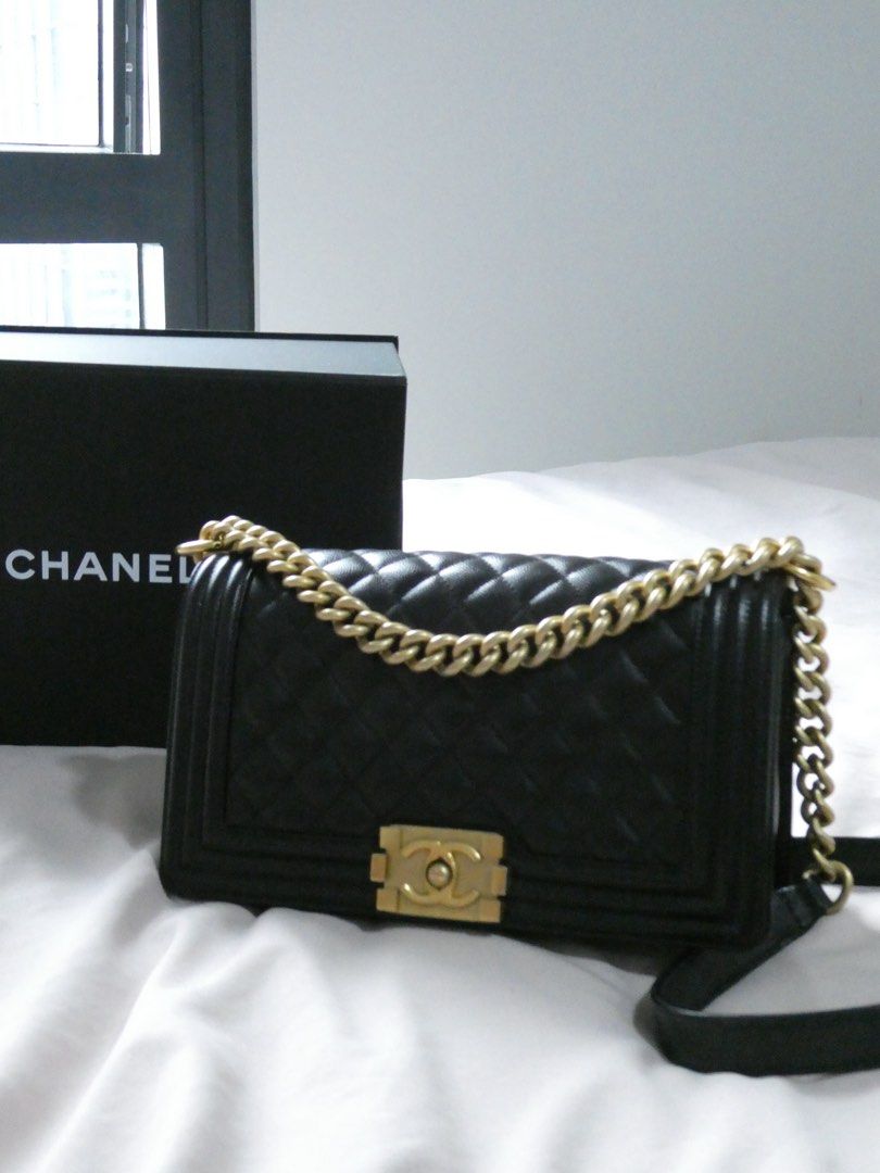 Chanel Boy Bag Medium Gold Chain (Category: Luxury Bags & Wallets) located in Quezon City. Submitted by shopwithfrance (Listing ID 1464106195, Image 2). Description: - Classic Chanel Boy bag - Black caviar leather - comes with box, paper bag, receipt, care cards -personally used; like new.