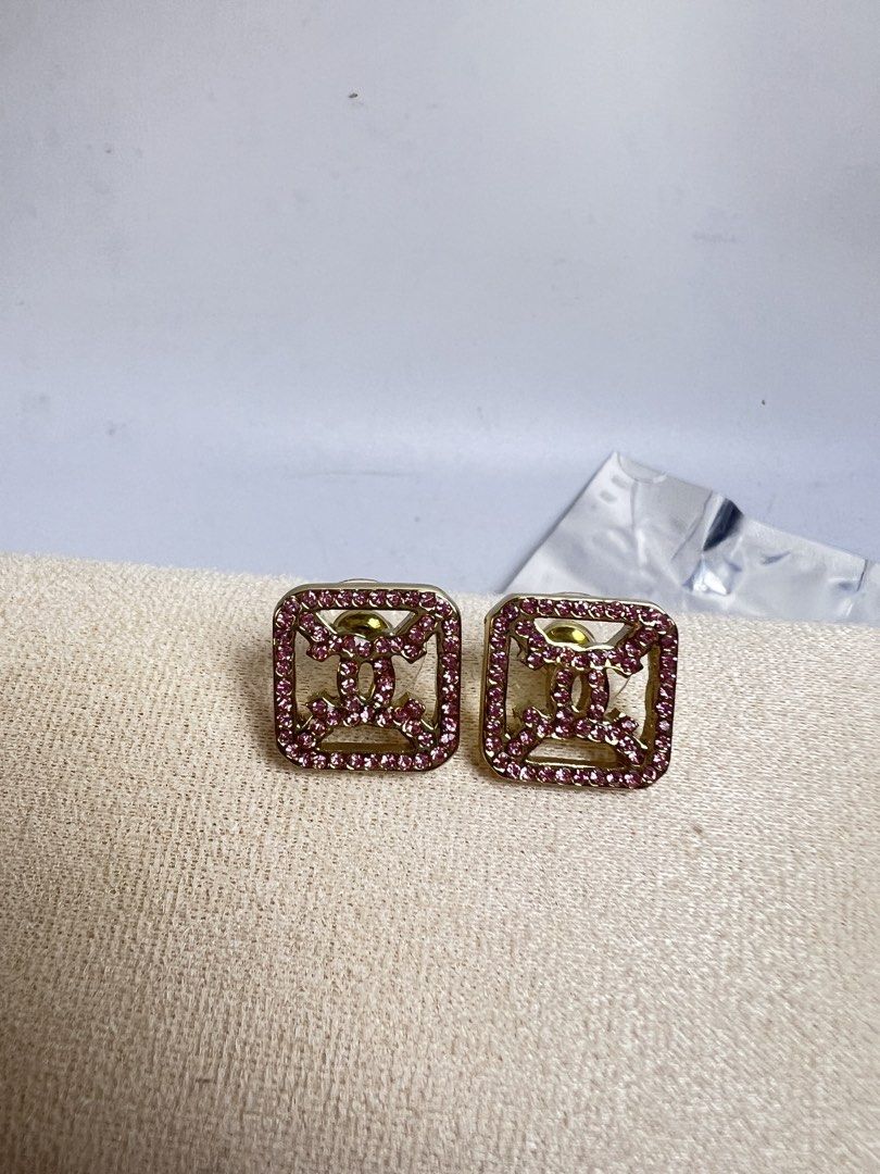 Chanel CC Square Pink Crystal Earrings (Category: Earrings) located in Baguio. Submitted by chiechie1234 (Listing ID 1463982793, Image 1). Description: - Square design with iconic CC logo - Accented with pink crystals - Gold-tone hardware - Statement pieces for a pop of color and luxury - with markings sa likod.