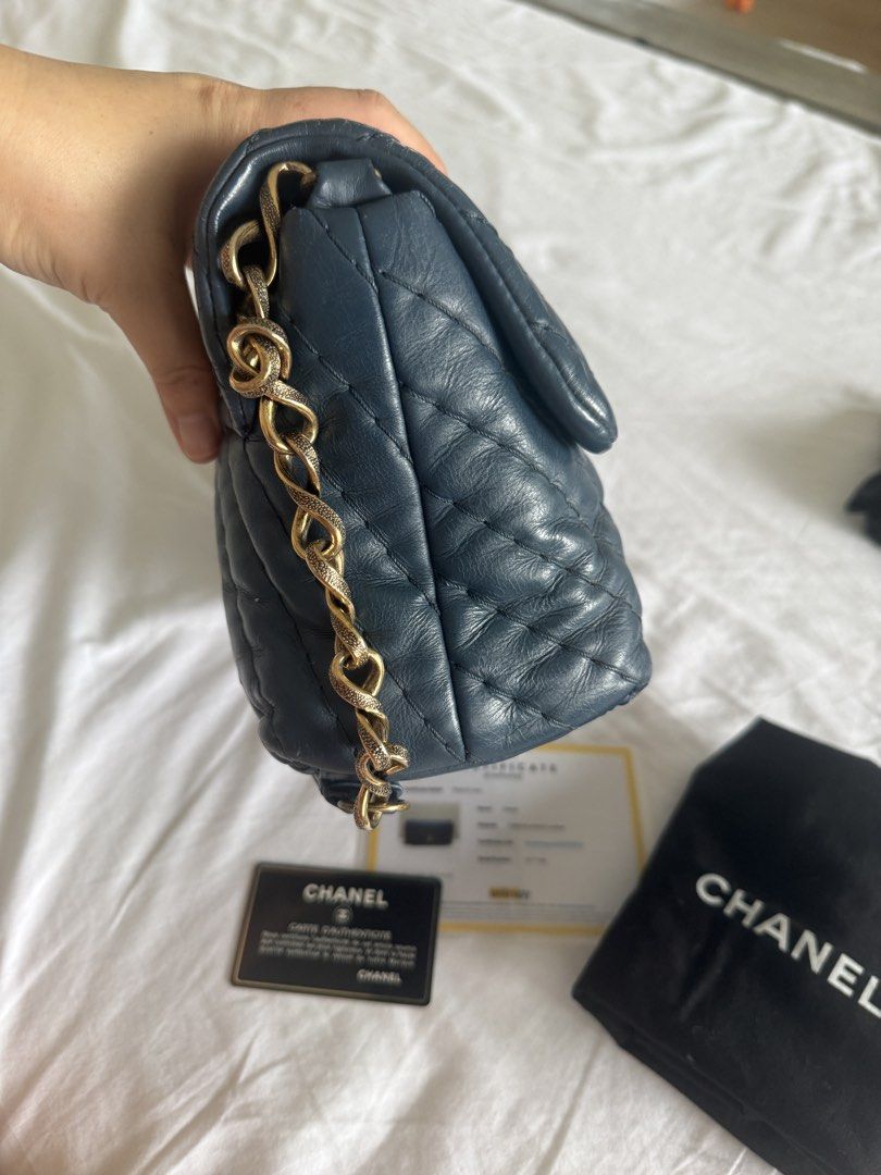 Chanel Flap in Blue (Category: Luxury Bags & Wallets) located in Calamba. Submitted by mom2girls (Listing ID 1464000570, Image 3). Description: Another chanel pang-harabas bag that only gets better with use. Has a minor tarnish sa twist knob due to the normal opening and closing of the bag di talaga maiiwasan. Can fit so many things pwede sa Nanay na madaming baby wipes na dala with 2 celphones, wallet, card case, perfume , make up and folding ha
