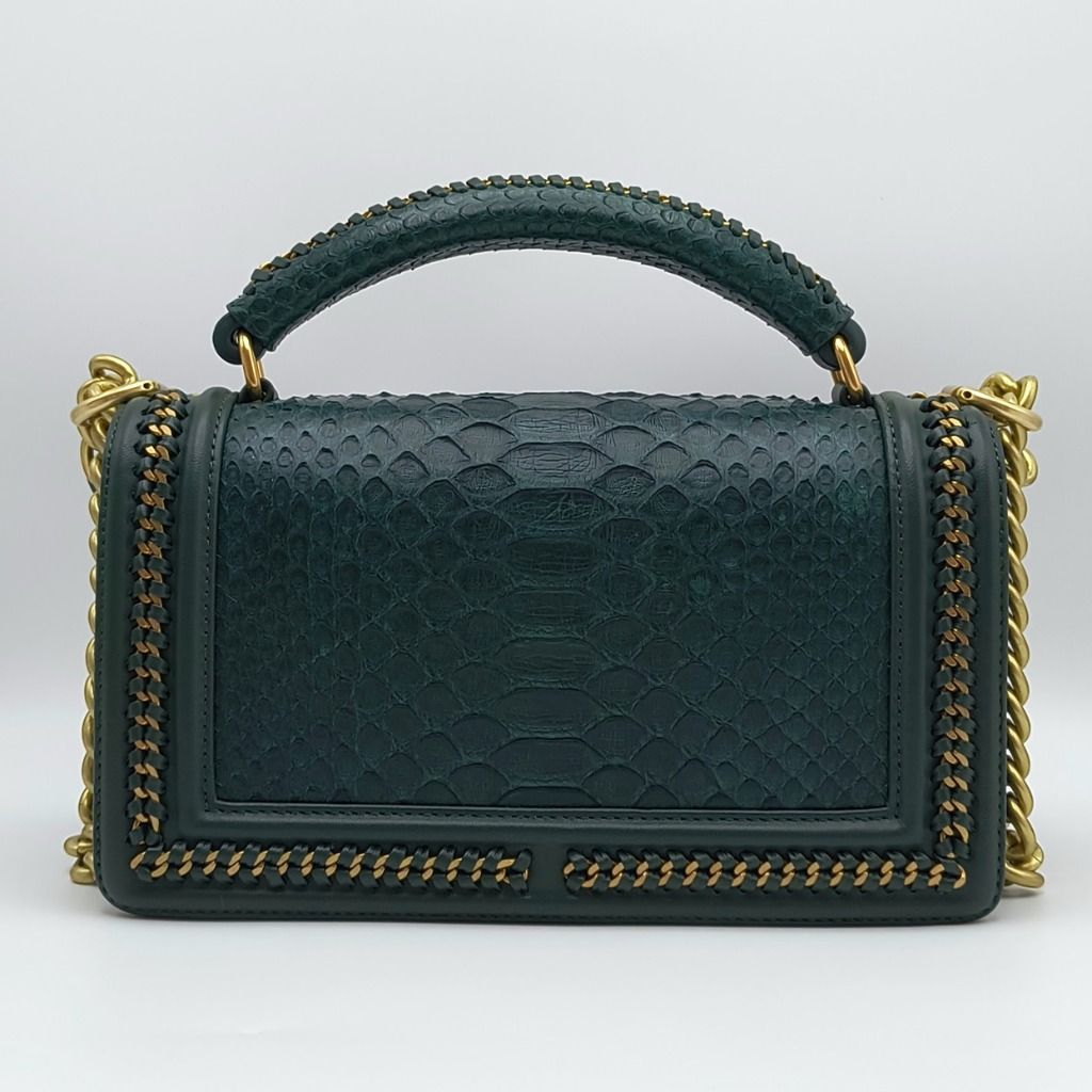 Chanel Le Boy Python Top Handle Bag Green (Category: Luxury Bags & Wallets) located in Cebu City. Submitted by theluxxaffair (Listing ID 1463979967, Image 3). Description: Chanel Le Boy Medium top handle bag in green python with leather trim and gold-tone hardware. Features the signature Boy CC push-lock closure, python top handle with woven chain detailing and a leather-threaded chain shoulder strap. Finished with woven chain trim and a leather-