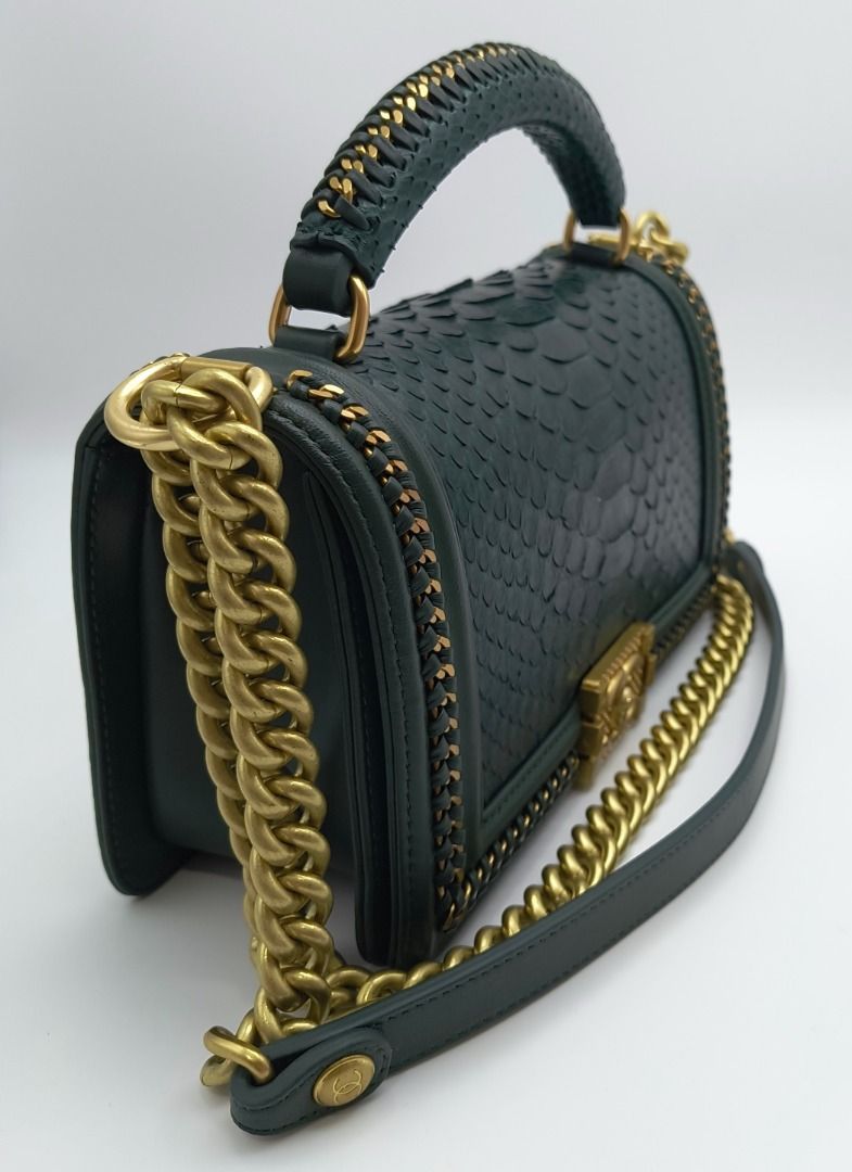 Chanel Le Boy Python Top Handle Bag Green (Category: Luxury Bags & Wallets) located in Cebu City. Submitted by theluxxaffair (Listing ID 1463979967, Image 2). Description: Chanel Le Boy Medium top handle bag in green python with leather trim and gold-tone hardware. Features the signature Boy CC push-lock closure, python top handle with woven chain detailing and a leather-threaded chain shoulder strap. Finished with woven chain trim and a leather-