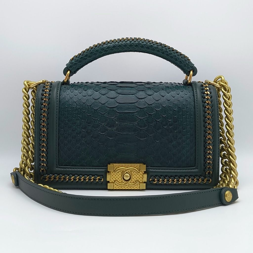 Chanel Le Boy Python Top Handle Bag Green (Category: Luxury Bags & Wallets) located in Cebu City. Submitted by theluxxaffair (Listing ID 1463979967, Image 1). Description: Chanel Le Boy Medium top handle bag in green python with leather trim and gold-tone hardware. Features the signature Boy CC push-lock closure, python top handle with woven chain detailing and a leather-threaded chain shoulder strap. Finished with woven chain trim and a leather-