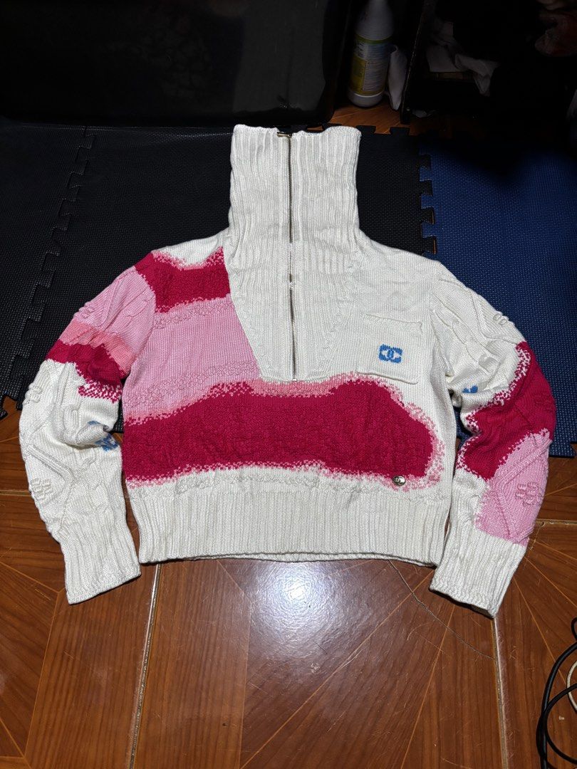 Chanel White Wool Knit Sweater Size 36 (Category: Coats, Jackets and Outerwear) located in Caloocan City. Submitted by neweagle-424b (Listing ID 1464064455, Image 2). Description: W 19 - 20 x 19 L white wool knit sweater - Size 36 - Half-zip turtleneck design - Unique pink and red abstract pattern on front and sleeves - Bold blue '5' graphic on the back - Made in Italy.