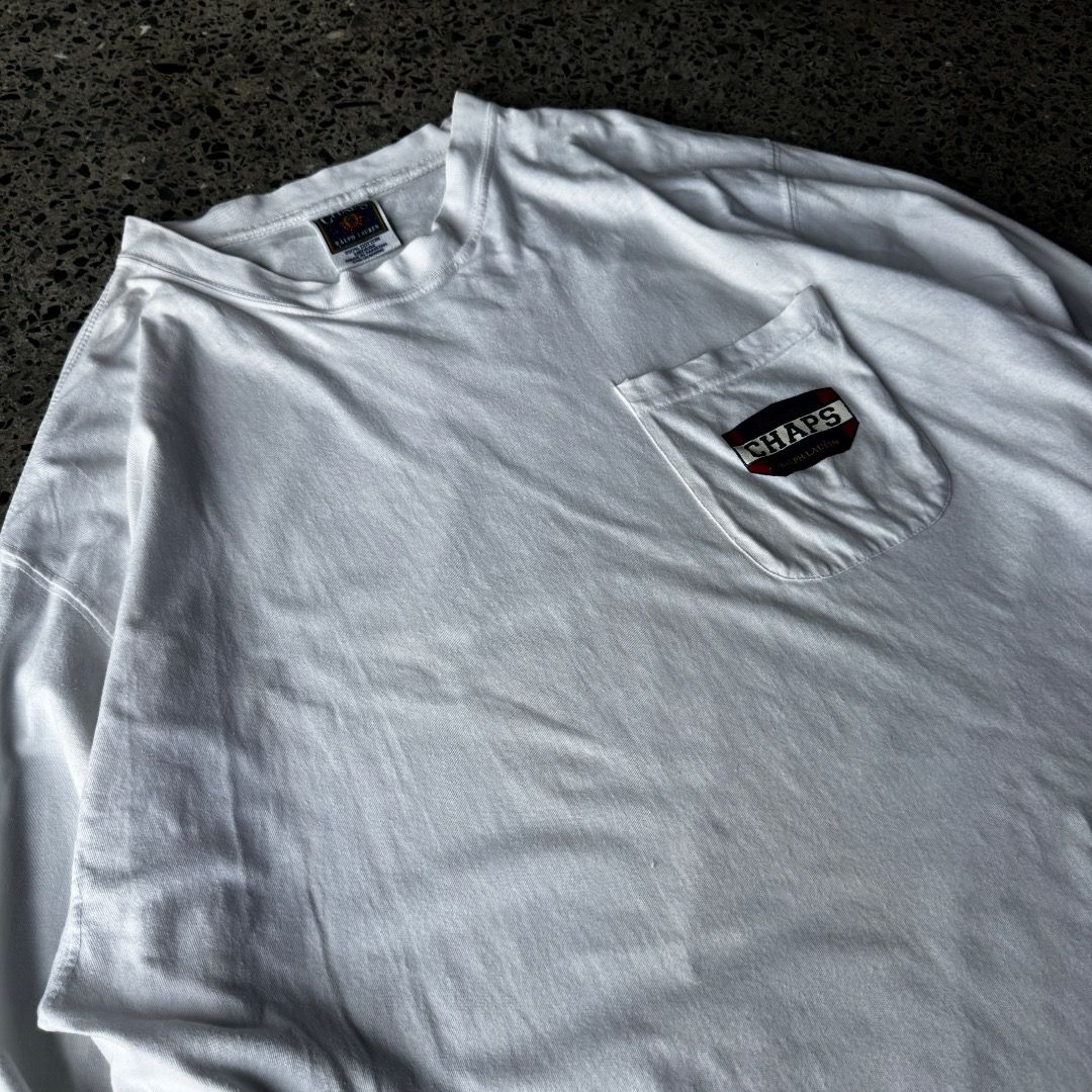 CHAPS WHITE LONGSLEEVED SHIRT (Category: Tshirts & Polo Shirts ) located in Quezon City. Submitted by theq.thriftshop (Listing ID 1464084493, Image 3). Description: PLEASE READ FIRST! MINE ₱299 + sf (FIXED) Size XL (L 28.5”, W 25”) Issues: Tiny stains, hole Color may vary due to lighting Model’s height: 5’9 💸 G-Cash payment 📦 J&T Nationwide shipping.