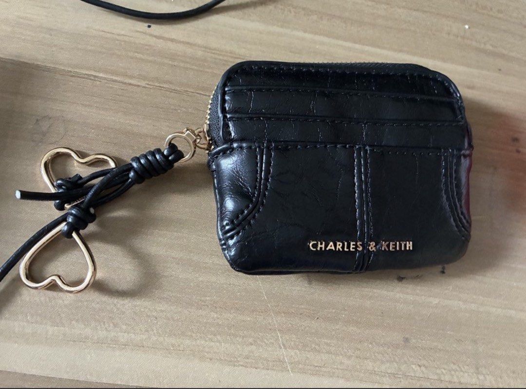 Charles & Keith card holder wallet (Category: Wallets & Card holders) located in Paranaque City. Submitted by jhingpreloveditems (Listing ID 1463939403, Image 3). Description: Brand new Original Still negotiable.